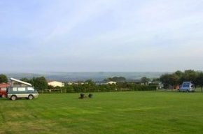 A welcoming campsite above the quiet coastal village of Runswick Bay where a sheltered beach and excellent coastal walks back onto the North York Moors National Park.